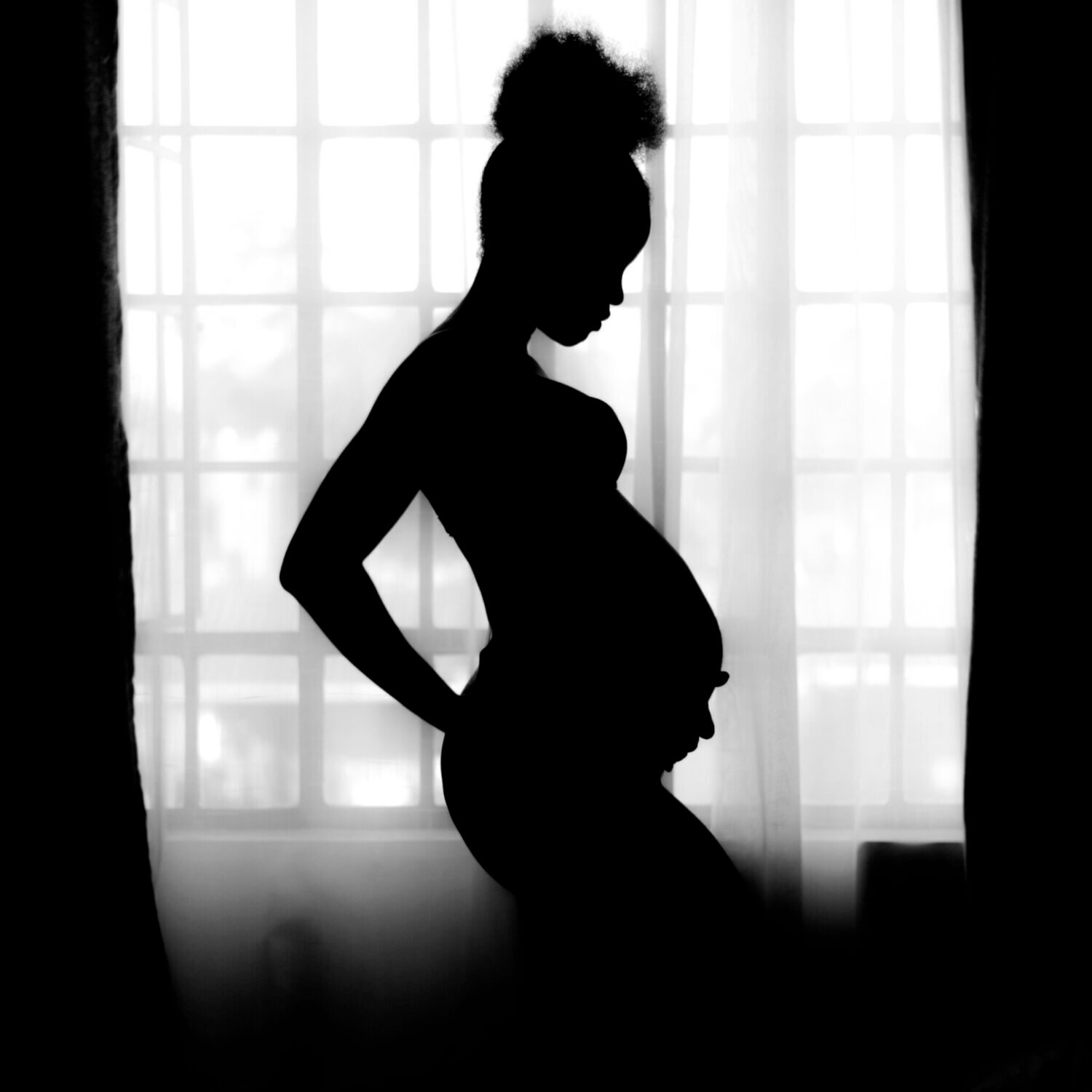 black and white image pregnant woman