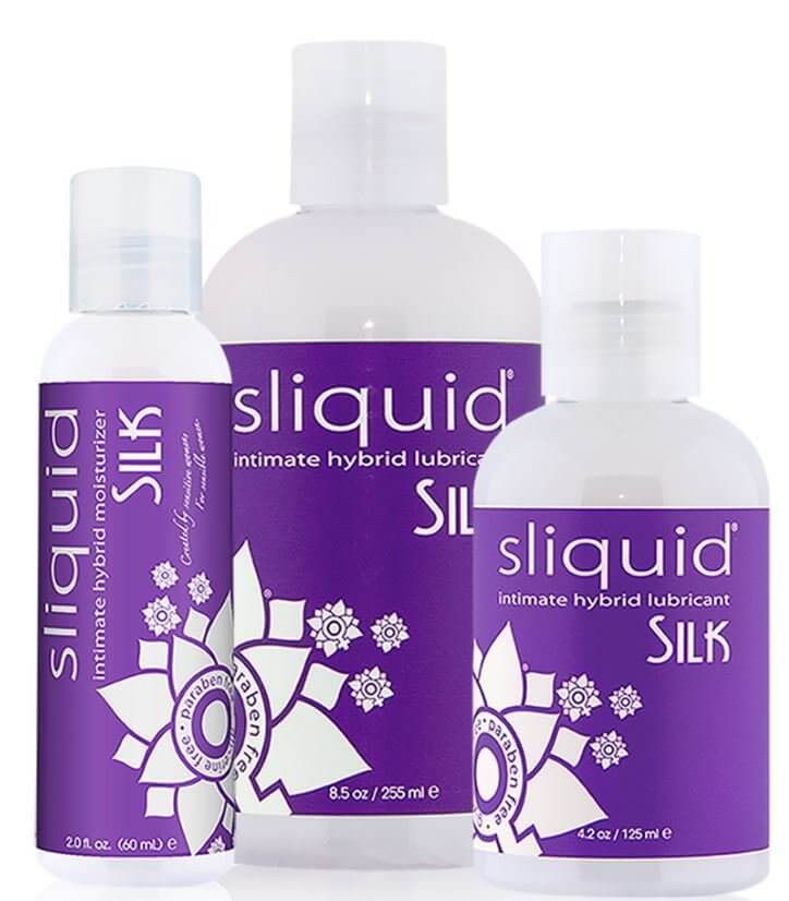 Various size purple label bottles of Sliquid Naturals Silk intimate hybrid lubricant and moisturizer