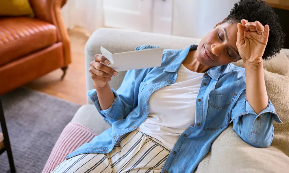 a woman experiencing a hot flash from menopause