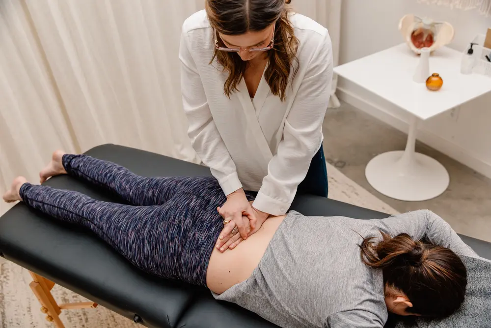 laura-meihofer-pt (1) A physical therapist provides manual therapy to a patient