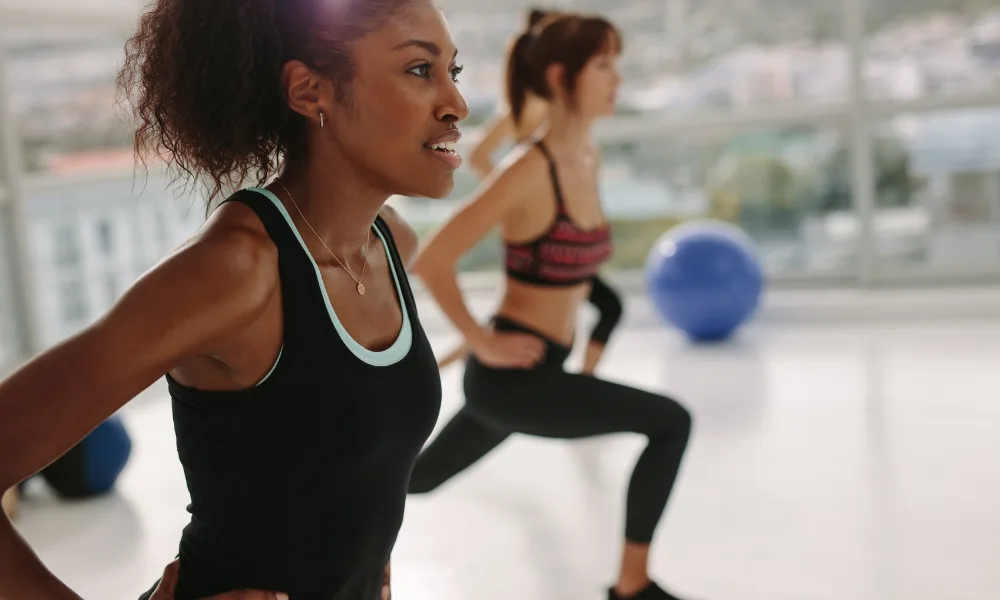 women-exercising Two women exercising