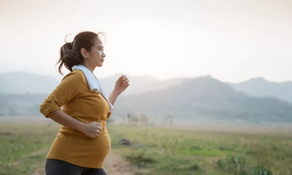 Pregnant woman going for a light run outside